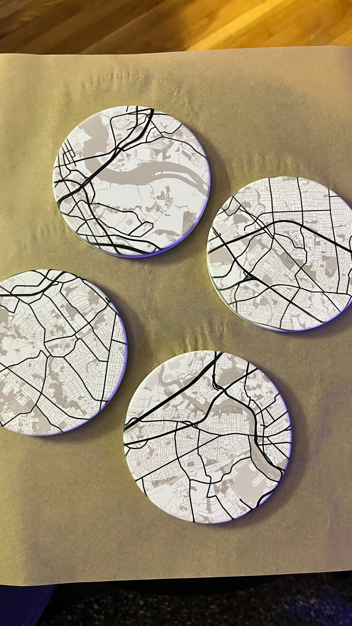 Map coasters detail showing street-level home location